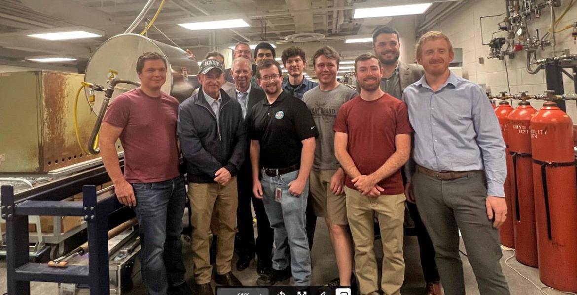 a large group of people in a wind tunnel testing facility