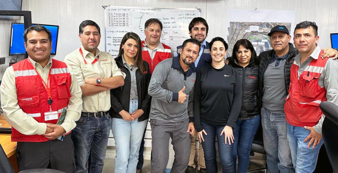 A group stands in a mining office