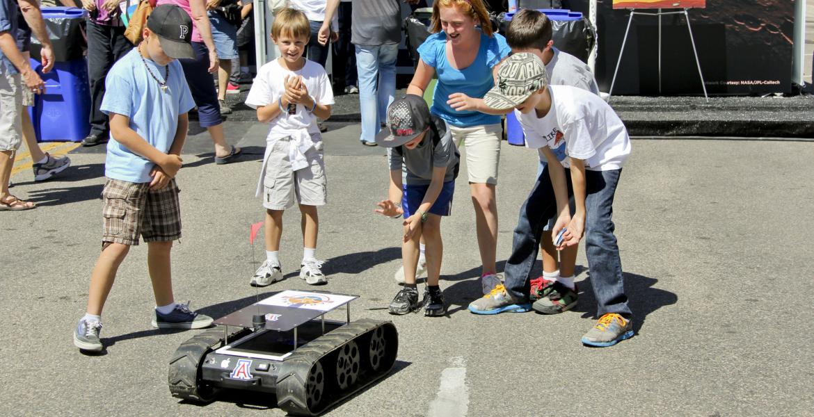 children playing with robot