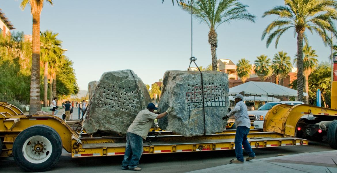 Crane Lifting Rocks