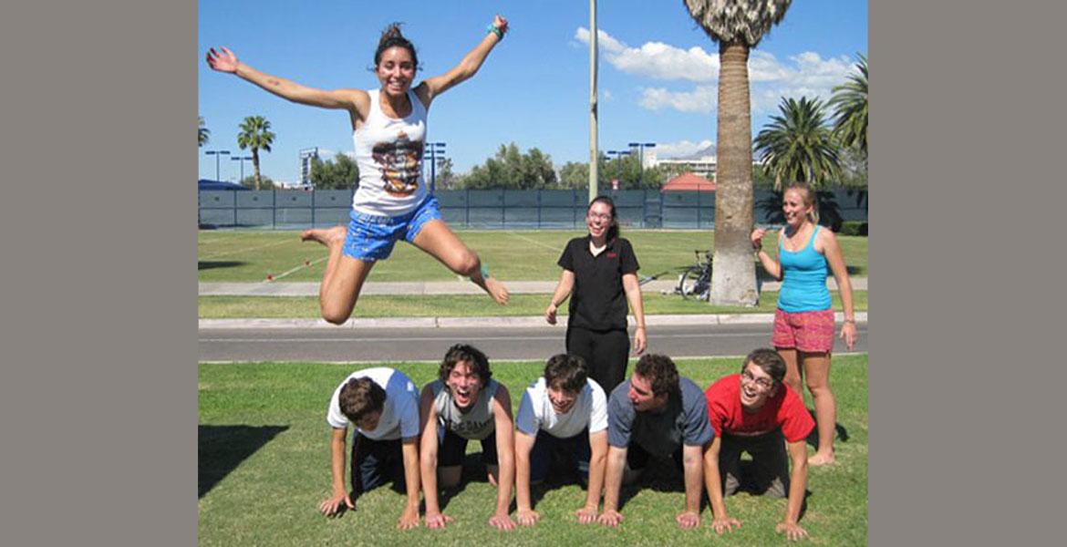 students doing acrobatics