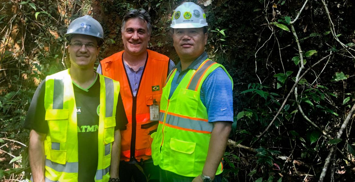 men standing in jungle