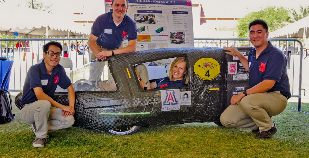Engineering seniors with their human-powered vehicle