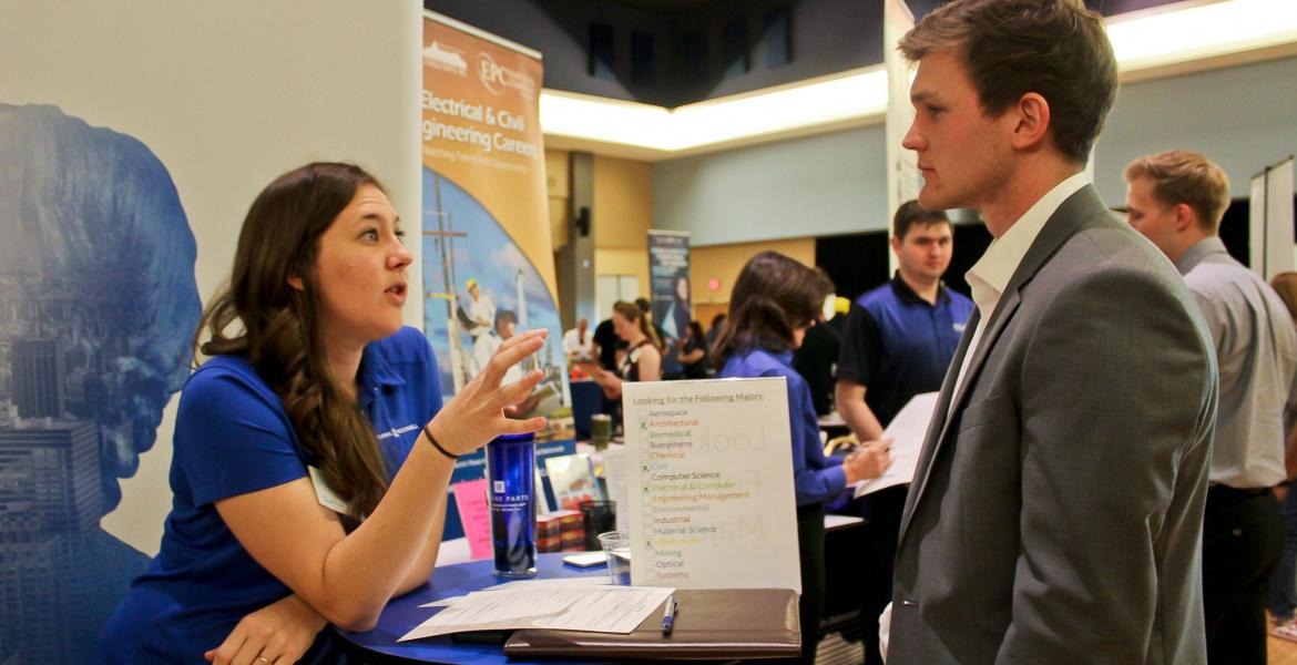 engineer and student at recruitment fair