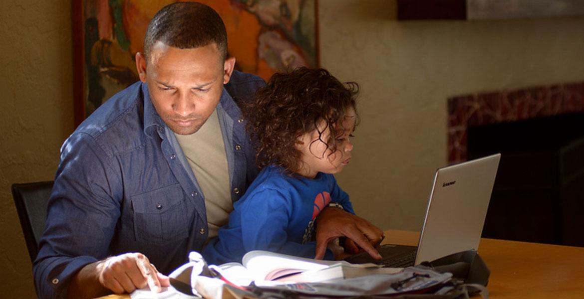 parent and child studying at home