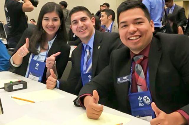 UA SHPE members Maria Lissette Flores, Fermin Prieto and Jaime Goytia celebrate winning the Academic Olympiad.