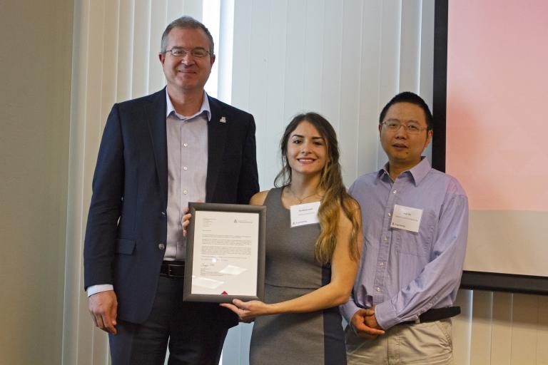 Elizabeth Pelto, outstanding senior in industrial engineering, with nominator Sean Wu and Craig M. Berge Dean David Hahn.