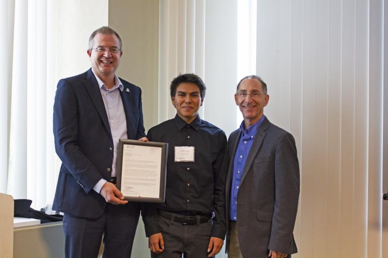 Daylan Toledo, outstanding senior in civil engineering, with nominator Dean Papajohn and Craig M. Berge Dean David Hahn.