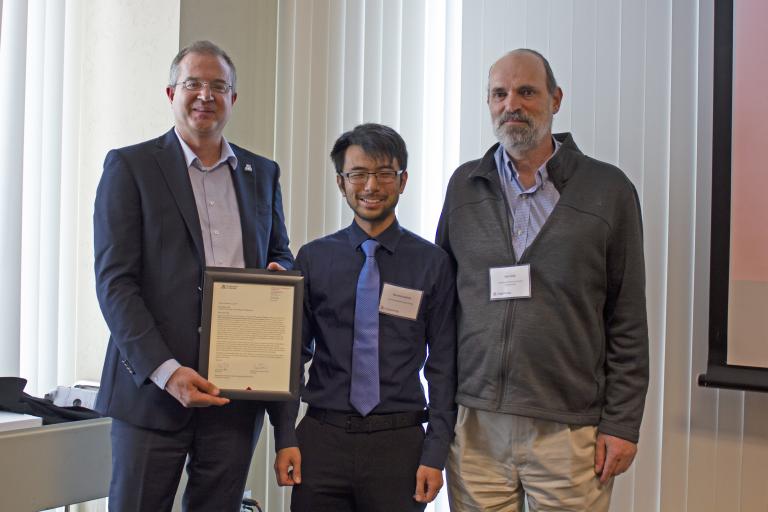 Warren Kadoya, outstanding graduate student in environmental engineering, with nominator Jim Field and Craig M. Berge Dean David Hahn.