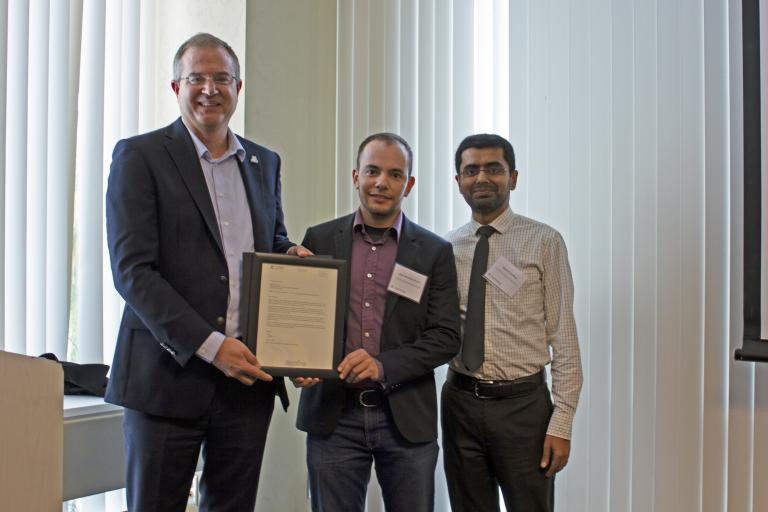 Jose Luis Ruiz Duarte, outstanding graduate student in systems and industrial engineering, with nominator Vignesh Subbian and Craig M. Berge Dean David Hahn.