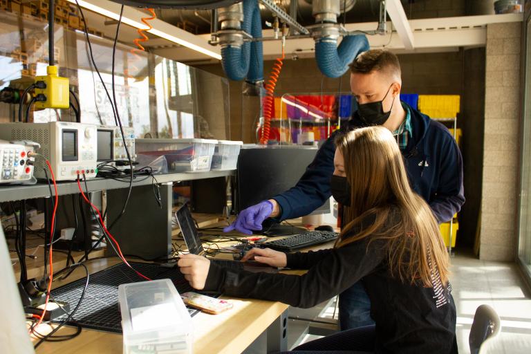 BME student Natalie Hall and TA Charles Perkins at work in the Salter Lab