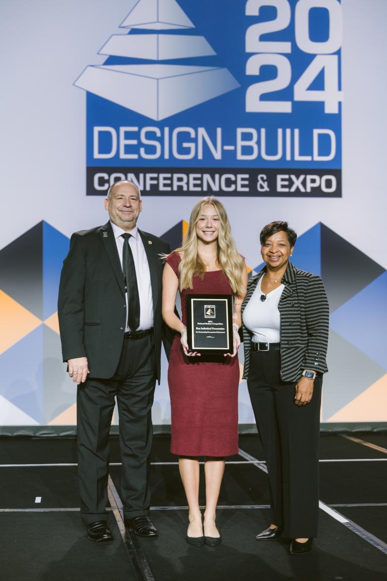 Lauren Johnson accepts her award for best individual presenter. Johnson will forever be glad she participated, she said: “Winning as an all-female team was a powerful reminder of what can be achieved through collaboration, determination and diverse perspectives,” said Johnson. “It is an incredibly comforting fact to know that this industry will one day be filled with females as wonderful and brilliant as the ones I now call my friends.”