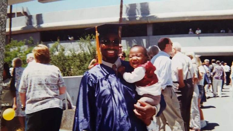 Brian Mushimba and his son.