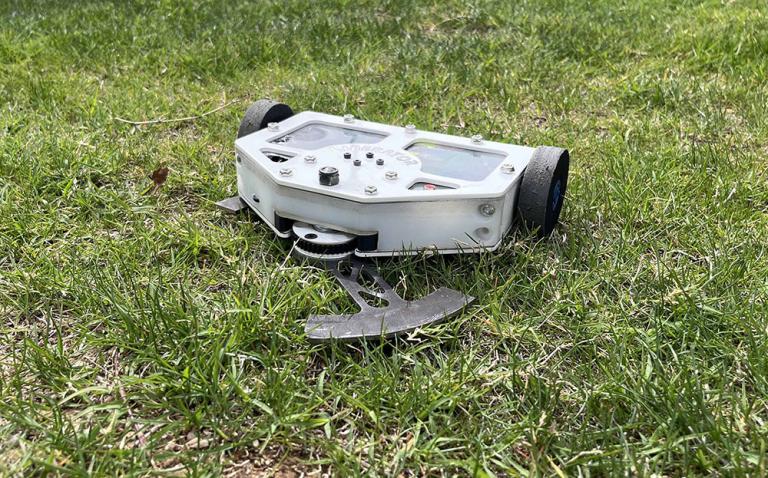 a robot on grass