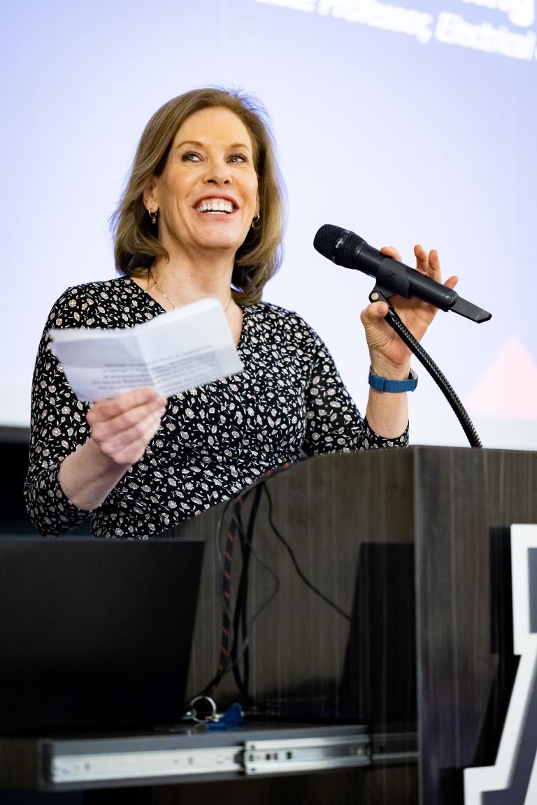 Kathleen Melde speaks at a podium