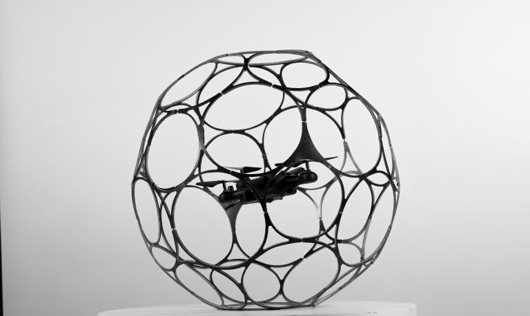 A drone surrounded by a spherical cage