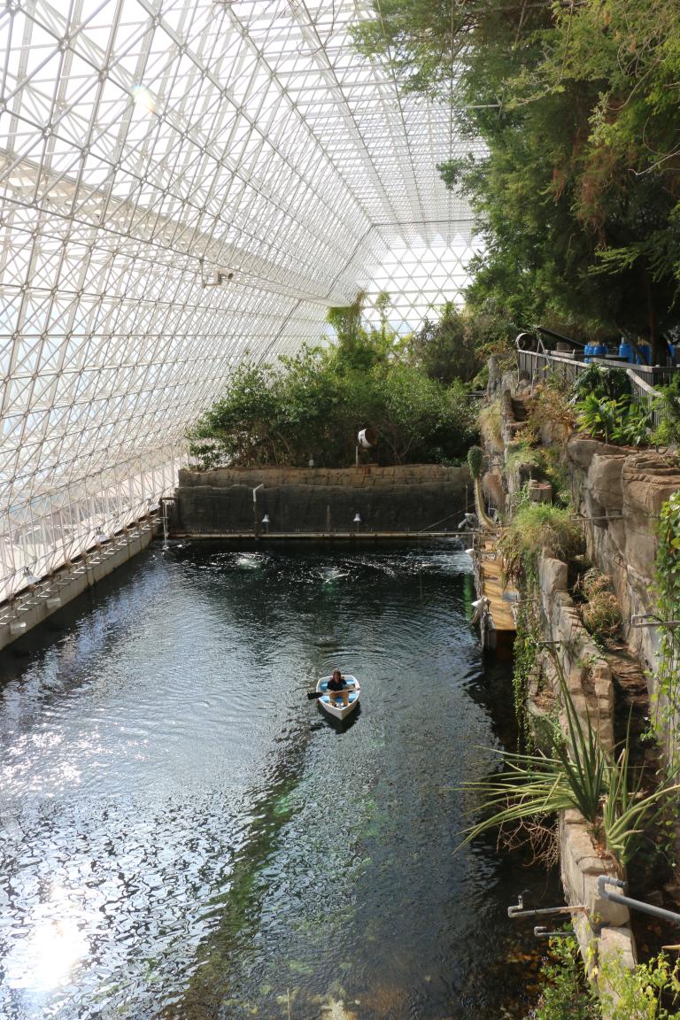 a boat travels on the Biosphere 2 ocean