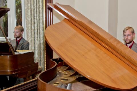 student playing piano