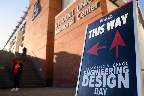 a sign for Craig M. Berge Design Day outside SUMC