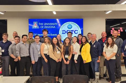 a large group in a University of Arizona classroom