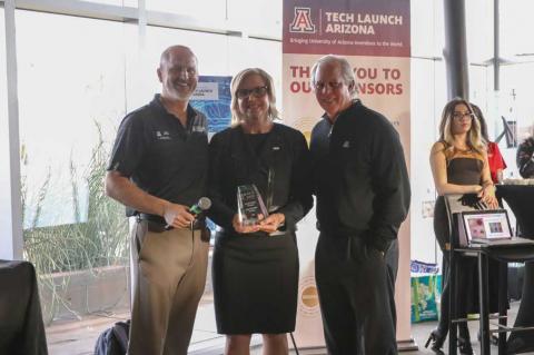 Doug Hockstad, Jennifer Barton and Dr. Robert C. Robbins