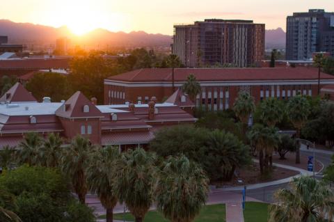 The University of Arizona mall and Old Main building, seen from above at sunset.