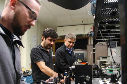 Joshua Olson, Veysi Demir and Nasser Peyghambarian in the lab