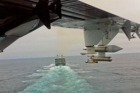 view of ship and ocean from plane