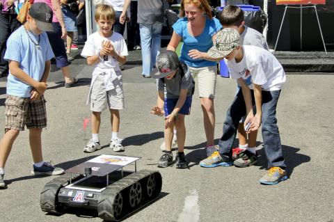 children playing with robot