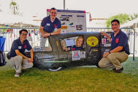 Engineering seniors with their human-powered vehicle