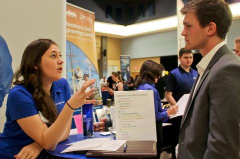 engineer and student at recruitment fair