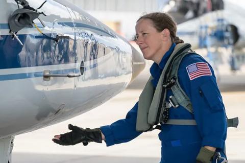 Jessica Wittner examines an airplane