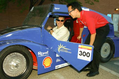 dean and student with solar car