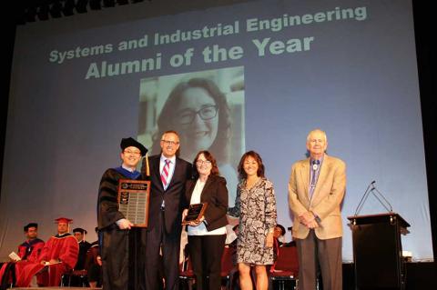 Young-Jun Son, Ted Landis, Marla Peterson, Ted Landis, Cindy Klingberg and Herb Burton on stage at SIE convocation ceremony