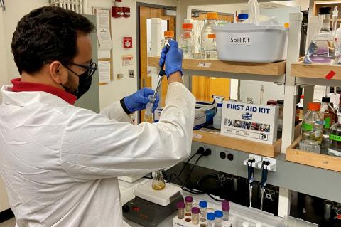 Marwan Abdujawad wearing a lab coat.