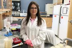 Christina Morrison, in a lab at the University of Arizona, works on waterless laundering for astronauts.