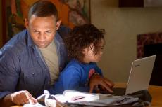 parent and child studying at home