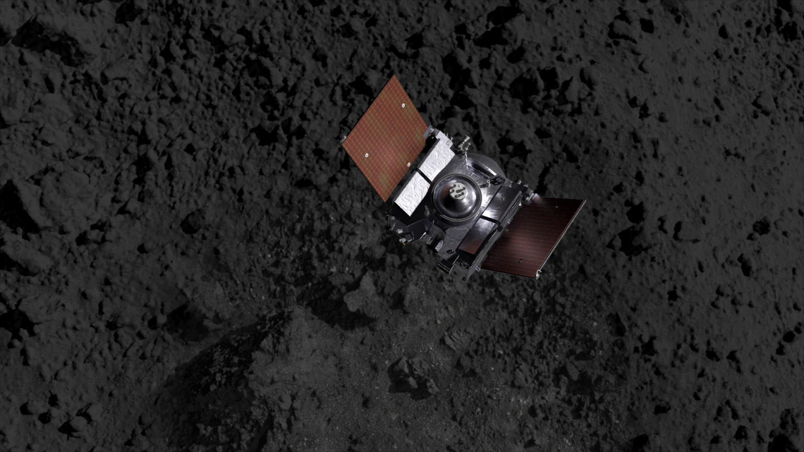 A spacecraft above an asteroid's terrain (artist's impression).
